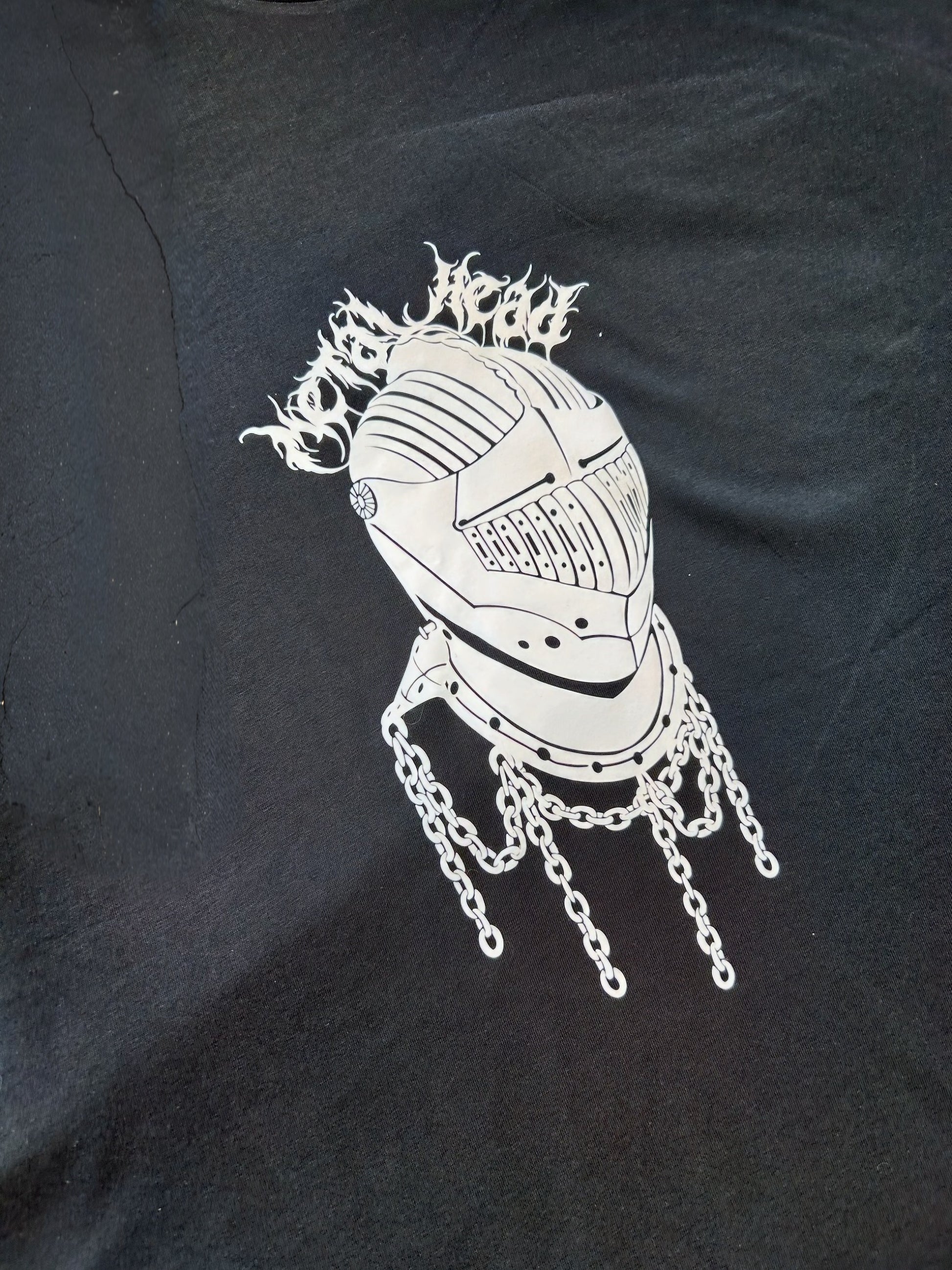 A photo of the metal head T-shirt on an angle 