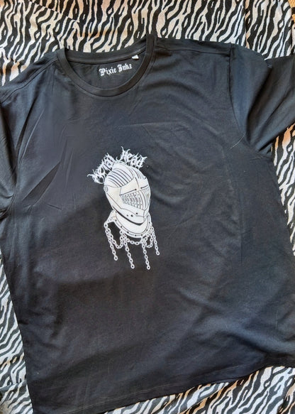 A photo of the metal head T-shirt with a zebra print background 